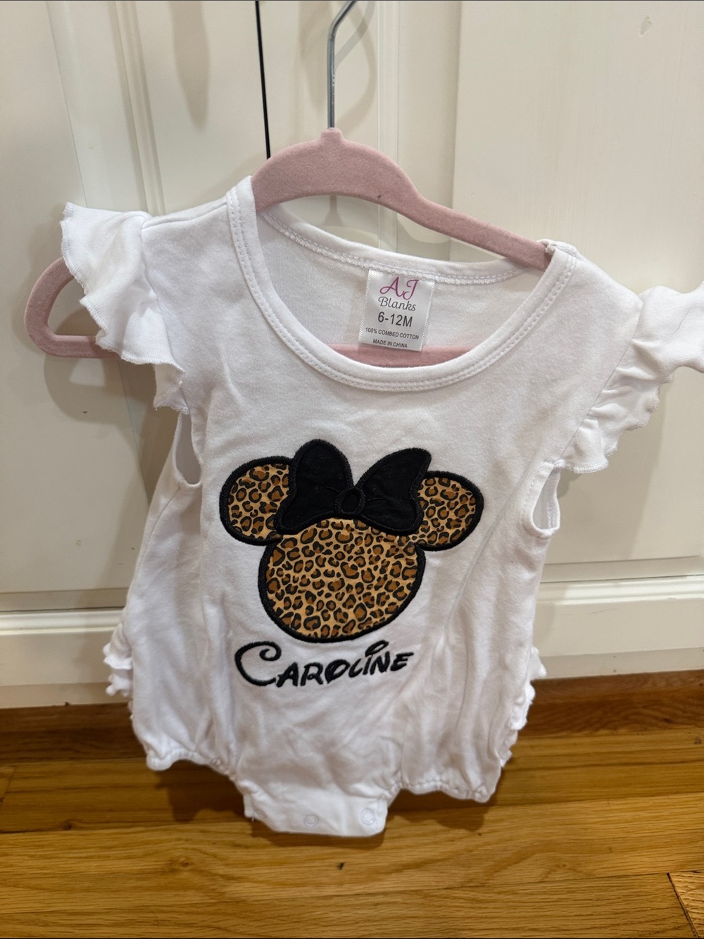 Disney White Onesie with Leopard Minnie Graphic and Black Bow Caroline